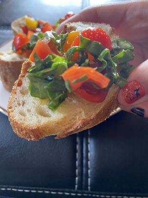 Enjoying bruschetta with 🥖  at As Kneaded Bakery in San Leandro