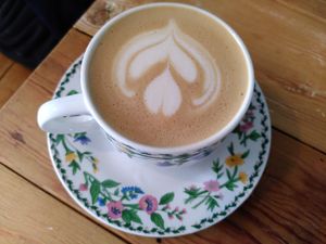 Decaf oat latte with a different design (September 2023) at Remedy Coffee Shop in York