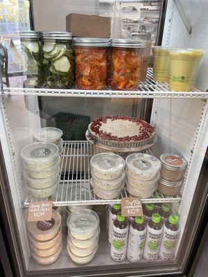 Pickles, kimchi, vegan mango lassi & cashew cheesecake   at Honey B Market in Santa Cruz
