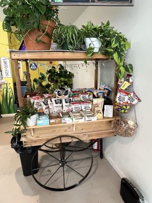 Cart of snacks for sale   at Honey B Market in Santa Cruz