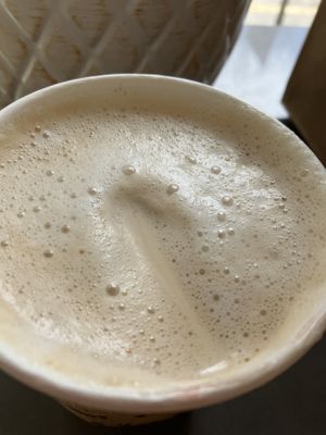 Coffee w frothy macadamia nut milk. Delicious   at Honey B Market in Santa Cruz