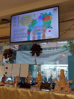 Watching SupremeMaster TV... at Loving Hut 愛家 - QingZhong St in Tainan