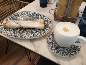 Apple and cinnamon Banitsa and a pea milk latte. Banitsa is a traditional dish, they have savoury and sweet options at Vita Rama in Sofia