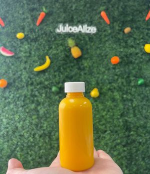 **NEW JUICE SHOT** I AM MIGHTY: Lemon, Ginger, Turmeric 💛 #Veganuary at Juicealize in San Jose