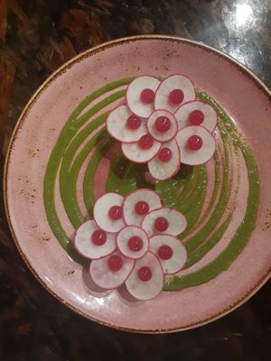 The beet and radish patties were not for me but the green sauce made the dish work. at Restaurant XO in Honolulu