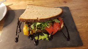 Vegan hummus antipasti sandwich at Kaffeerösterei Martermühle in Assling