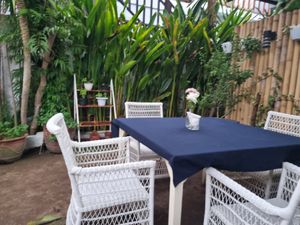 Outdoor seating at My House in 