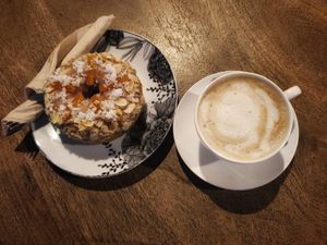 Café con leche corto de café y leche de soja at VegAmazing Doughnuts - Tirso de Molina in Madrid