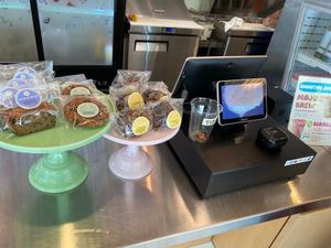 Counter with baked goods for sale at Mother Juice in Cambridge