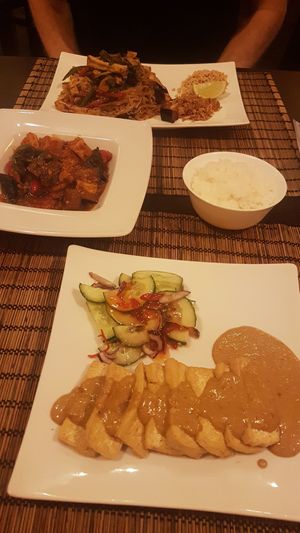 Fried tofu with peanut sauce, eggplant and tofu with noodles and pad thai at Horai in Krakow