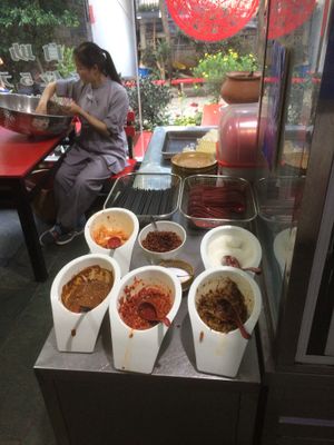 Sauces choices and behind rice  at Yi Ran Tang Vegetarian Buffet in Dali