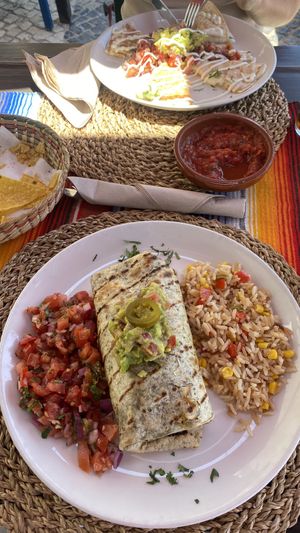 Vegan Burrito with guacamole, rice and tomatoes  at Hola Torito - Restaurante Mexicano in Olhao