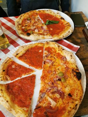 Marinara pizza and vegan pizza with jackfruit at Pizza Quasi Napoletana in Eger