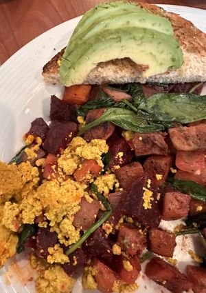 Tofu scramble and vegetable hash with sweet potatoes, beets, carrots, onion, avocado 🥑 and sourdough toast  at Blue's Egg in Milwaukee