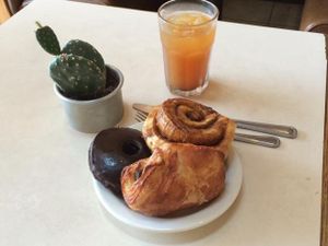 donut, chocolate croissant, cinnamon roll  at Beet Box Bakery & Cafe in Denver