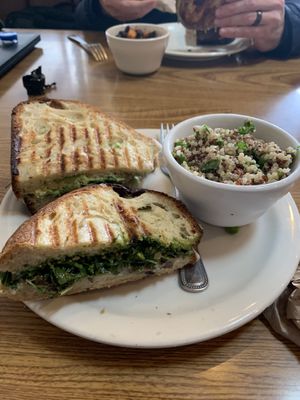 Avacado sandwich half in the back, cremini panini half in the front, w side of mint quinoa  at Beet Box Bakery & Cafe in Denver
