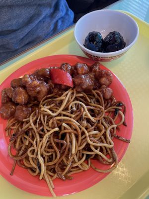 Fried noodles orange chicken and sweet soy sauce meat balls   at Oscar in Tokyo