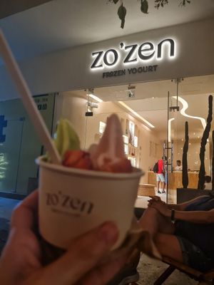 strawberry and mint-chocolate frozen yogurt with topings at Zo'Zen Yogurt in Playa Del Carmen