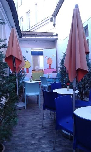 peaceful outdoor seating at Cosmos-Heart Cafe in Augsburg