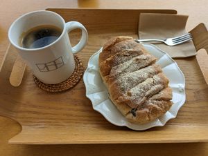 Olive bread and Americano at Cafe The Light - 카페더라이트 in Jeju