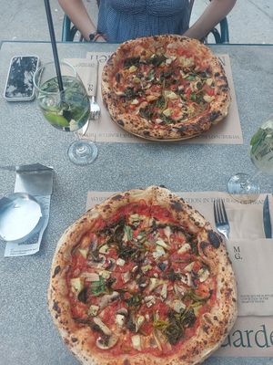 This pizza was good, and as two female travellers, we felt safe here. 2 pizzas and 2 Hugo spritz was 2800 (£25) which is very reasonable. Had a kid dancing by table, though. at Millennium Garden in Tirana