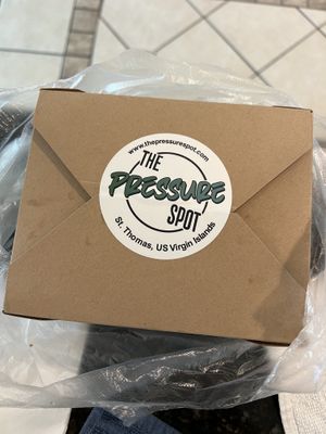 Can get food to go or dine in.  at The Pressure Spot in St Thomas