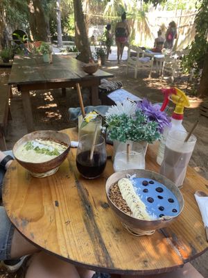 The garden and our smoothies, smoothie bowls & coffees   at YAAB Vegan Kitchen in Puerto Escondido