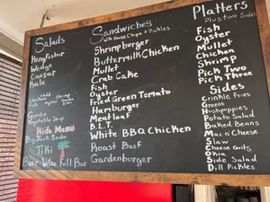 Garden burger on regular menu can be fully vegan, as are several of the sides (labeled on paper menu) at Kingfisher Sandwiches in Pensacola