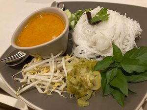 Special - lions mane mushroom curry with rice noodles and condiments  at Kina Kind Cuisine in Pattaya
