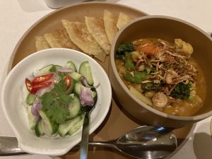 Chickpea curry (with veg instead of potato) served with cucumber salad and roti  at Kina Kind Cuisine in Pattaya