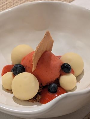 White chocolate covered frozen cheeseballs with sorbet at Kina Kind Cuisine in Pattaya