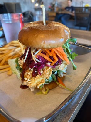 Vegan Krispy Fried Tofu
Crispy fried tofu topped with garlic chili ketchup, house pickled red cabbage, grated carrot & cucumber. at Q Burger in Qualicum Beach