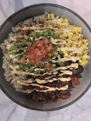 Fiesta bowl (jackfruit carnitas, corn, Cuban beans, pico de gallo and chipotle cream on brown rice)  at Ver De in El Nido
