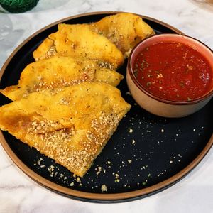 Garlic bread with marinara saucee  at Ver De in El Nido