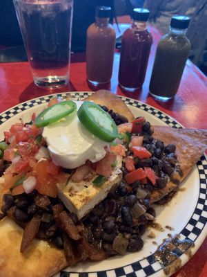 Excellent hot sauce selection (real sour cream no vegan) at The Fly Trap in Ferndale