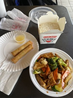 Tofu with mixed vegetables and vegetable spring rolls :) at Green Sprout in Atlanta