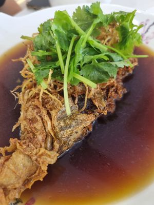 Dark sauce home made "fish" at Green Feel Restaurant in Masai