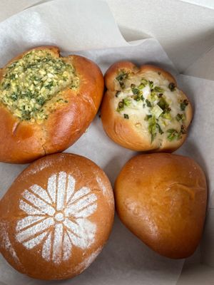 Garlic bun, Green onion bun, Red bean bun, Egg & Cheese bun at Tai Zhan Bakery in Saratoga