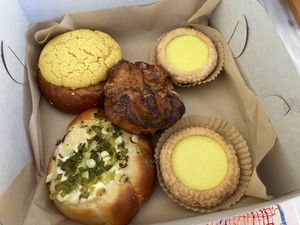 Pineapple Bun, Eggless Tarts, Sesame Kouign Amann, and Green Onion Bun ❤️  at Tai Zhan Bakery in Saratoga