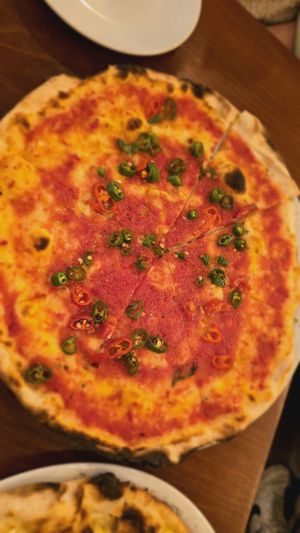 Cheeseless vegan margharita with fresh chillies at Just Pizza & Pasta in Douglas