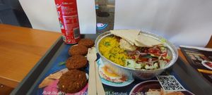 Simple but tasty and abundant. Plate + side of falafel + coke, less than 15€. It's good to found vegan food in such small town. at Hummus Junction in Setubal