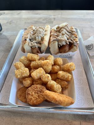 Beyond brats and kids meal with Impossible nuggets and tater tots  at Dog Haus in Belmont