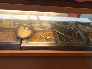 The sides: again great variety: the potato mash looking thing in an oval dish is mashed green papaya!!! Wow! Amazing!! at Ma's Vegi Deli in St Thomas