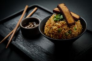 Yakimeshi Tofu Teriyaki:
Veggie fried rice with grilled tofu cubes marinated in our homemade teriyaki sauce. Savory, satisfying & 100% plant-based. at Ishiki - Cloud Kitchen in Mexico City