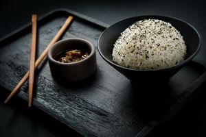 Steamed Japanese rice seasoned with a blend of seaweed for a subtle marine umami touch. Simple, comforting & totally plant-based. at Ishiki - Cloud Kitchen in Mexico City