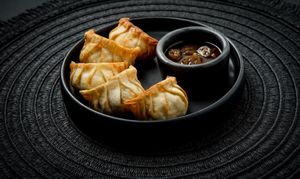 Gyozas de Tofu:
Soft tofu marinated with a hint of ginger, mixed with finely chopped peanuts & cashews. Delicate, nutty and full of flavor. at Ishiki - Cloud Kitchen in Mexico City