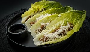 Daizu Hunan:
Marinated soy meat with bold flavor & juicy texture, served in lettuce cups with semi-sweet mushroom sauce. Unreal taste, 100% plant-based. at Ishiki - Cloud Kitchen in Mexico City