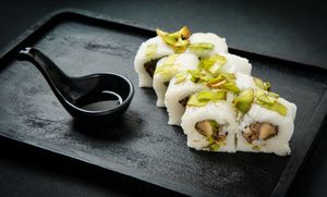 Mucho Macho Roll:
Painfully good (super spicy!) roll filled with shiitake, cucumber & avocado, topped with crispy scallions. Worth every tear. at Ishiki - Cloud Kitchen in Mexico City