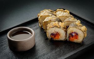 Rainbow Roll:
Nori-wrapped roll filled with red bell pepper, carrot, purple cabbage & our spicy rainbow sauce. Colorful, fresh & with a perfect kick. at Ishiki - Cloud Kitchen in Mexico City