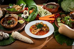 Couliflower grilled with squash puree and roasted tomato sauce with peas. at Maxan in Antigua